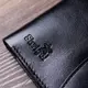 Мужское глянцевое кожаное портмоне Shvigel 16617 Черный