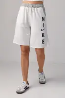 Женские трикотажные шорты с надписью Nike - молочный цвет, M