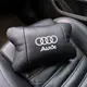 Автомобильная подушка для подголовника Audi – черная натуральная кожа.