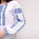 Женская блуза Гармония с синей вышивкой 56