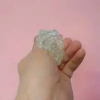 Іграшка-антистрес з блискітками "Mesh Squish Ball: Ніжність" (зелений)