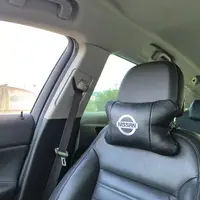 Подушки в авто 2 шт Nissan, натуральная кожа, с логотипом Ниссан, на подголовник для вашей машины