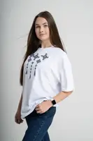 Жіноча oversize футболка з вишивкою на грудях у білому кольорі "Меланія" L-XL