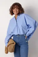 Жіноча сорочка oversize з гудзиками на спинці - блакитний цвет, S