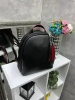 Чорна з червоним всередині — стильна сумка-рюкзак Lady Bags на два відділення на блискавках, зі знімними китицями (0387)