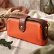 Яркий клатч с интересной защелкой из натуральной кожи Vintage 22424 Оранжевый