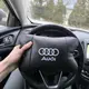 Автомобильная подушка для подголовника Audi – черная натуральная кожа.