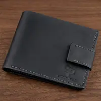 Тонке шкіряне портмоне унісекс GRANDE PELLE 11219 Чорне