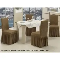 Altinkoza. S. kahve чохли зі спідничкою на стільці.