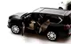 Масштабная модель автомобиля Lexus LX570 RESTEQ 1:24 — металлическая инерционная машина со светом и звуком, в подарочной коробке