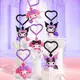 Механическая игрушка-сюрприз "POP TOP KUROMI & MY MELODY - МИЛЫЕ КРЫЛЬЦЫ" (микс видов)