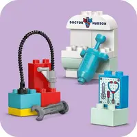 Конструктор LEGO Duplo Disney Визит МакКвіина в гараж Дока (10456)
