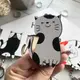 Черно-белая деревянная ключница с котиками