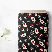 Тканина плательна штапель Бренді Chanel 5 чорний, Написи