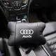 Автомобильная подушка для подголовника Audi – черная натуральная кожа.