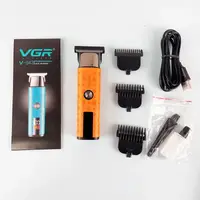 Триммер VGR V-943 с 3 насадками LED (Оранжевый)