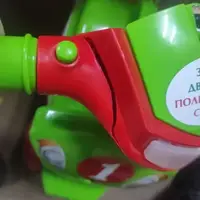 Уцінка. Мотоцикл-каталка "Спорт" (салатовий) музичний Тріщина на кермі та вибита частина пластику