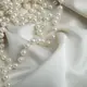 Ткань костюмная атласная Scarlett крем