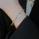 Женский золотистый браслет с кристаллами код 2295