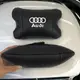 Автомобильная подушка для подголовника Audi – черная натуральная кожа.