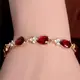 Женский браслет с красными камнями код 1099