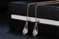 Золотистые серьги цепочки с цирконами код 791-1