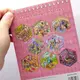 Roombook(Румбук) 8 локаций и наклейки к ним "Зверотрополис" (МАЛИНОВЫЙ)