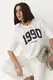 Футболка oversize з принтом 1990 - молочний цвет, ONE SIZE