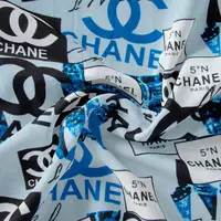 Ткань штапель Бренди Chanel блакитний, Написи