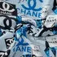 Ткань штапель Бренди Chanel блакитний, Написи