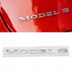 Эмблема наклейка на крышку заднего багажника Tesla Model S (1013738-00-C)