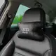 Автомобильная подушка для подголовника Audi – черная натуральная кожа.